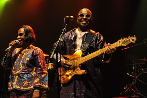 LONDON, UNITED KINGDOM - APRIL 13: Mariam Doumbia and Amadou Bagayoko of Amadou & Mariam performs on stage at Shepherds Bush Empire on April 13, 2012 in London, United Kingdom. (Photo by C Brandon/Redferns via Getty Images)